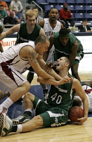 USC Upstate's Ivica Grgurovic (40) protects the ball from Armstrong Atlantic's David Lopez during the Peach Belt Conference Championship Game in Greenwood on Sunday.