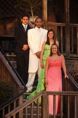 On-air personalities from BCN-TV pose in their prom best at The Cypress Inn restaurant in Tuscaloosa. From top, Farris Husseini from Northridge High School, George Miller from Central High School, Saylor Blankenship from Northridge and Alison Wright from Paul W. Bryant High School. Dresses are courtesy of Amanda’s Weddings and Formals. Tuxedos are courtesy of Burch & Hatfield.