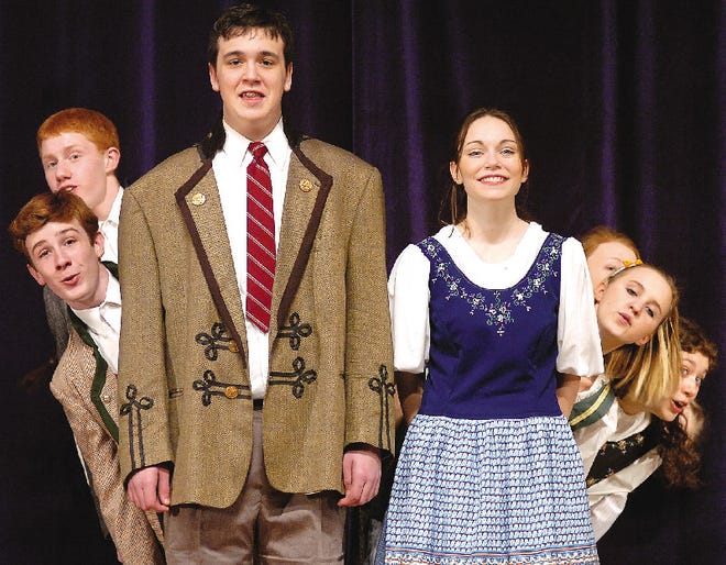 Pleasant Valley students, from left, Chris Adams as Kurt Vontrapp, Andy Wisiewski as Friederich Vontrapp, Frank Schierloh as Captain Vontrapp, Jacqueline Palmer as Maria Vontrapp, Erica Olsen as Louisa Vontrapp, Nicole Kaminski as Marta Vontrapp and Oliva Weiss as Liesl Vontrapp practice a scene from the musical "The Sound of Music" during a dress rehearsal at the Pleasant Valley High School Auditorium Tuesday.