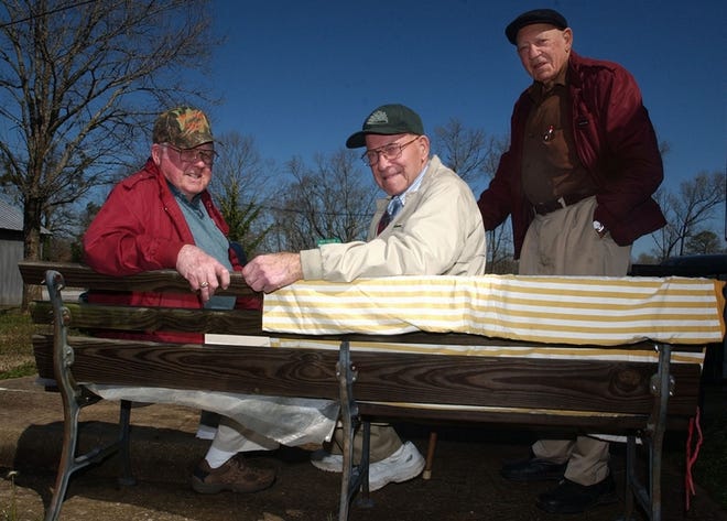 From left, John Foster, Earl Perry and Kenneth Miller were among the folks who showed up Friday morning on the “gossip bench" next to the post office in Coaling.