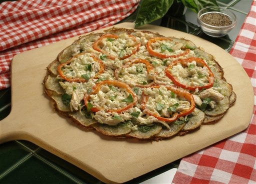 This photo provided by the Idaho Potato Commission shows Idaho Potato Crusted Pizza, made with a recipe from Bev Jones, of Brunswick, Mo. The easy-to-make but original recipe won first prize in a contest.
