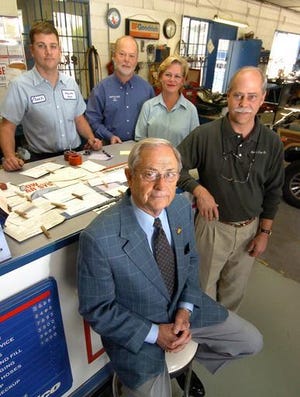 Shop Foreman Chuck Ashley (clockwise from top left), President J.W. ''Chuck'' Smith III, Office Manager Betty Smith, Smith Tire Co. President Darren Smith and retired President J.W. ''Jimmy'' Smith Jr. have pitched in at Smitty's Auto Service. The family company is entering its 70th year of business.