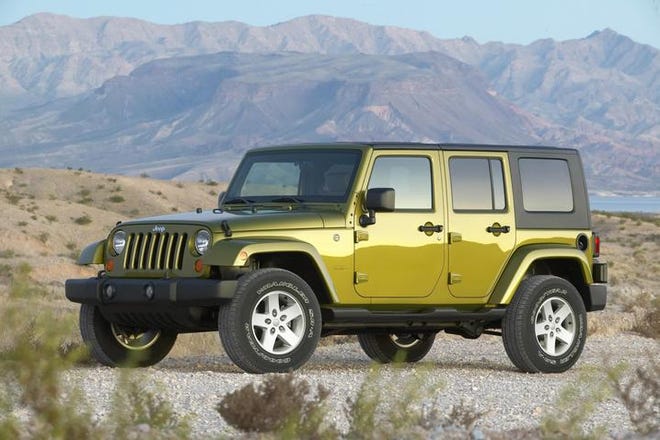 Jeep rolls out four-door Wrangler, compact SUV