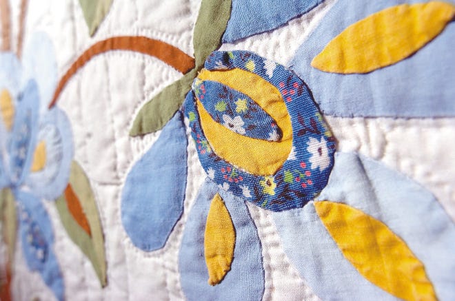 A close-up of the stiching in Kathie Miller's homemade quilt titled the "Tree of Life".