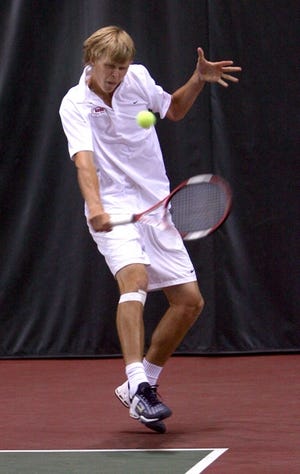 Alabama’s Mathieu Thibaudeau returns a volley during a men’s doubles match at the SEC Championships on Friday.