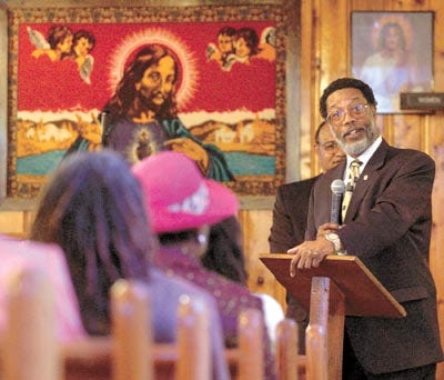 Fourth Vice President of the state NAACP Ronald White speaks about the organization to the congregation of Zion Hill Missionary Baptist Church on Sunday.