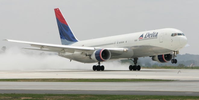 A Delta 767 jet becomes the first flight to take off on the new fifth runway at Hartsfield-Jackson Atlanta International Airport on Tuesday. The 9,000-foot runway is scheduled to open for commercial flights May 27.