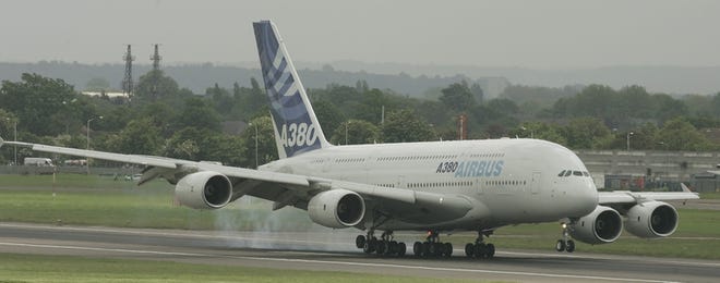 An Airbus A380 aircraft lands at London's Heathrow Airport on Thursday. The world's biggest passenger airliner landed for the first time at Europe's busiest airport to see if London Heathrow is ready for the Airbus A380.