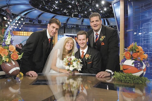 After the wedding, ESPN's Mike Golic and Mike Greenberg, left to right standing, pose with newlyweds Catherine and Jason West.