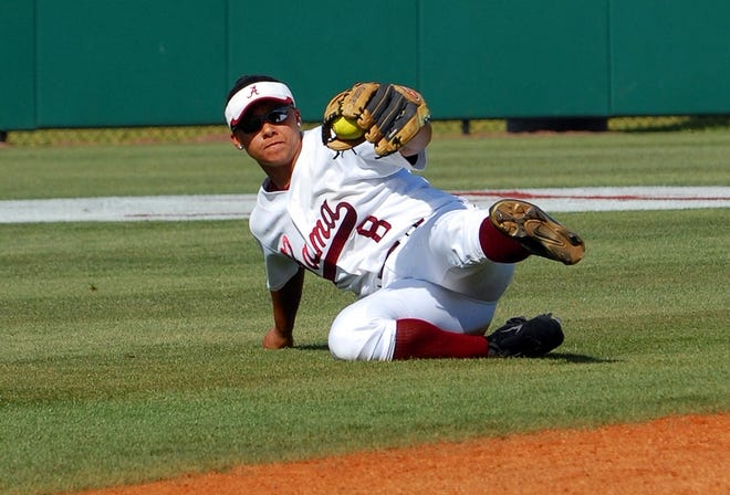 Alabama center fielder Brittany Rogers makes a sliding catch during the sixth inning of the Crimson Tide’s home game against LSU in April.