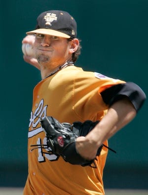 Tennessee pitcher Luke Hochevar delivers against Florida in the first inning of the opening game of the College World Series in Omaha, Neb., on June 17, 2005. Hochevar was drafted by the Kansas City Royals with the No. 1 overall pick in the Major League Draft on Tuesday.