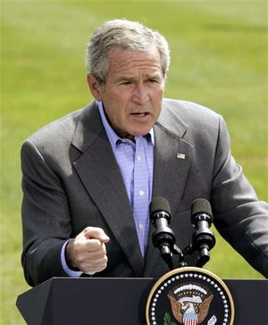 President Bush gestures during a joint press availability with Danish Prime Minister Anders Fogh Rasmussen, not pictured, at Camp David, Md., Friday, June 9, 2006 outside Washington.