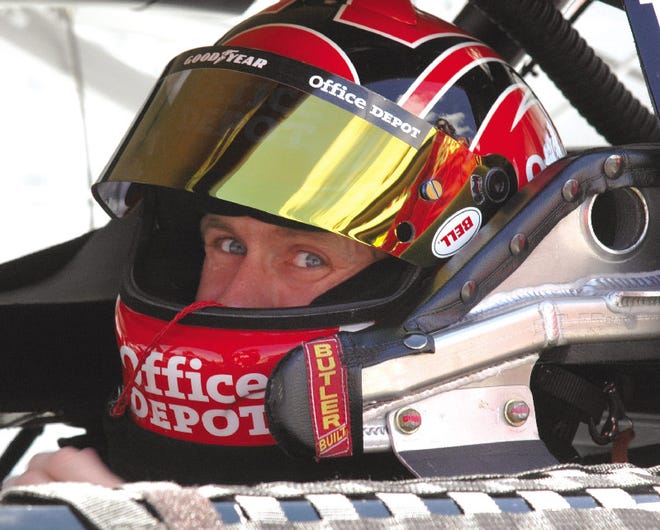NASCAR driver Carl Edwards sits in his car just before the start of the Pocono 500 Sunday afternoon.