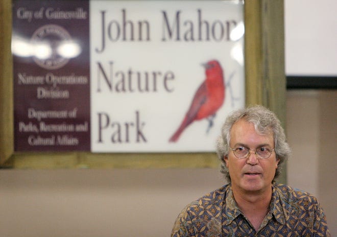 John Mahon III recollects on the memory of his father, Dr. John Mahon, as apart of his keynote speech Thursday during the ribbon-cutting ceremony for the John Mahon Nature Park.
