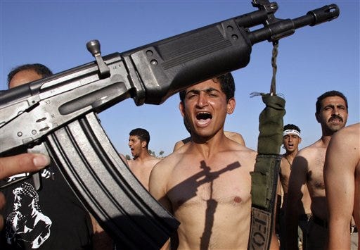 Palestinian members of the new Fatah militia train in the West Bank refugee camp of Jenin, Thursday, June 15, 2006. The Fatah force of 2,500 men was deployed in Jenin on June 3, 2006 and was the group's answer to Hamas militia that was deployed in Gaza last month.