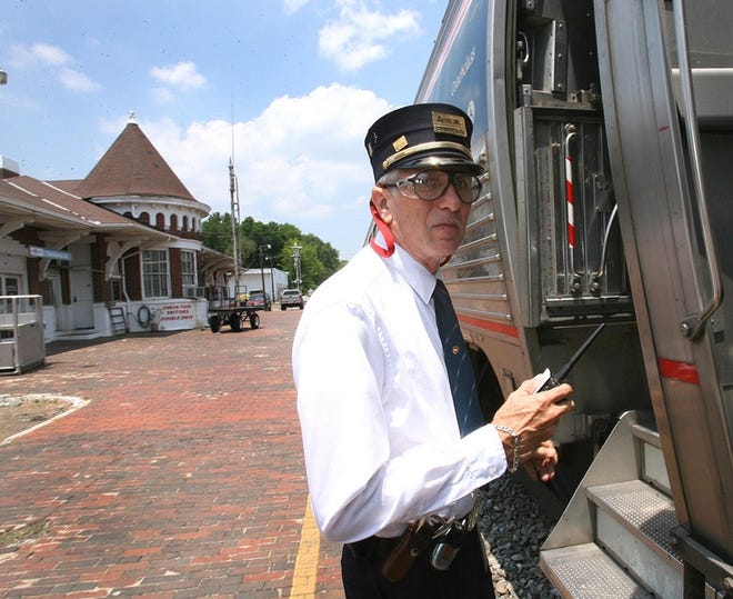 Amtrak trian conductor Mike Parker prepares to depart the station on Greensboro Avenue on Wednesday.