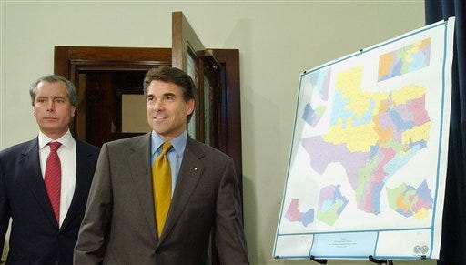 Texas Lt. Gov. David Dewhurst, left, and Gov. Rick Perry enter a news conference in this Oct. 9, 2003 file photo, in Austin, Texas, where they displayed a new congressional redistricting map, shown on the right. On Wednesday, June 28, 2006, the U.S. Supreme Court threw out part of a Texas congressional map engineered by former House Majority Leader Tom DeLay. The court ruled that some of the new boundaries failed to protect minority voting rights. But in a fractured decision, the court ruled that state lawmakers may draw new maps as often as they like, not just once a decade as Texas Democrats claimed.