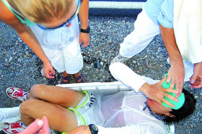 In this July 2005 photo, Jurek sits in a cooler of ice water to cool off as he competes in the race, which starts in Death Valley and finishes half-way up Mount Whitney in California. Jurek won the race and set a course record in 2005 (AP Photo/Courtesy Badwater.com, Chris Kostman, File)
