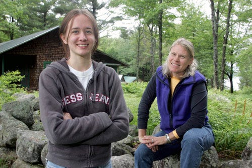 Jessica Scott, a counselor, left, and Pam Cobb, director of Camp Runoia pose in Belgrade Lakes, Maine. Scott removed a blog and limited access to her Facebook at the request of the camp's administrators. Camp administrators are becoming more concerned about negative images and information about their camps appearing on the Internet.