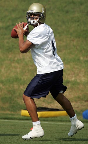 Georgia Tech quarterback Reggie Ball throws a pass during football practice Thursday. (AP Photo/John Bazemore)