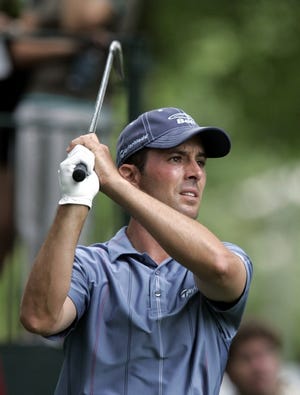 Mike Weir watches his drive on the 17th hole during the first round of the Buick Open at Warwick Hills Golf & Country Club in Grand Blanc, Mich.