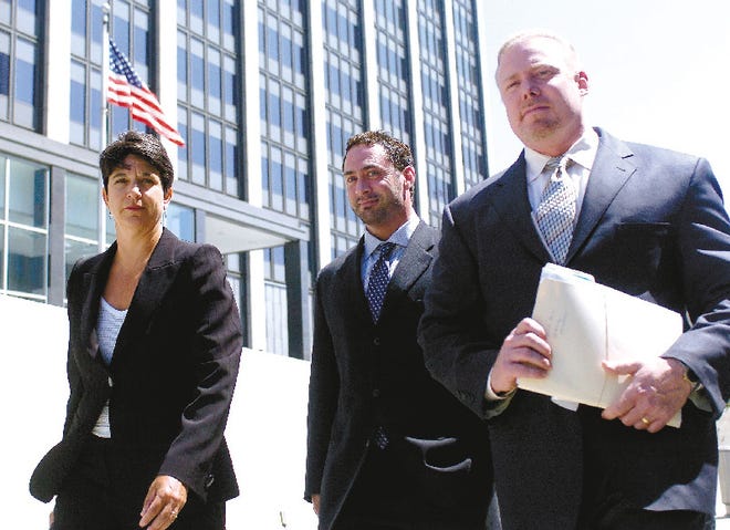 Patrick Arnold, center, leaves federal court with his attorneys Nanci Clarence, left, and Rick Collins on Friday, Aug. 4, 2006 in San Francisco. Arnold, creator of the previously undetectable steroid dubbed "the clear," was sentenced Friday to three months in prison and three months home confinement for his role in a widening sports drug scandal.
