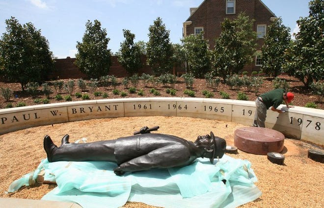 A statue of former University of Alabama football coach Paul W. Bryant lies outside Bryant-Denny Stadium in Tuscaloosa, Ala., Monday August 7, 2006. The university is preparing for its first game of the season against Hawaii on September 2, 2006.