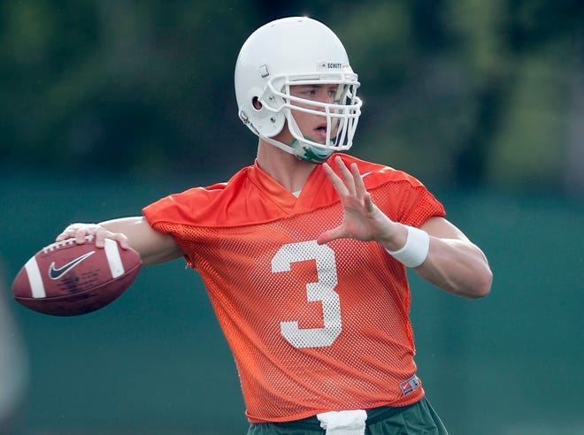 Quarterback Kyle Wright was impressed as Miami practice opened: "Guys showed a lot of good things on the first day,'' Wright said.