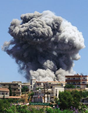 This photo released by the United Nations Interim Force In Lebanon, UNIFIL, shows smoke rising in the village of Naqoura, southern Lebanon, Sunday, Aug. 13, 2006, following an Israeli forces bombardment. Statements on both sides of the border portend no quick end to the bloody conflict despite the U.N.-demanded cease-fire. The U.N. document calls for Israel to withdraw in conjunction with the insertion of a strengthened U.N. peacekeeping force of about 15,000 troops and an equal number of soldiers from the Lebanese army.
