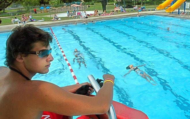Lifeguard John Liguori, 16, of Shawnee-on-Delaware keeps a watchful eye over swimmers from his lifeguard tower on Tuesday, the last day the Stroudsburg Borough pool was open for the season.
