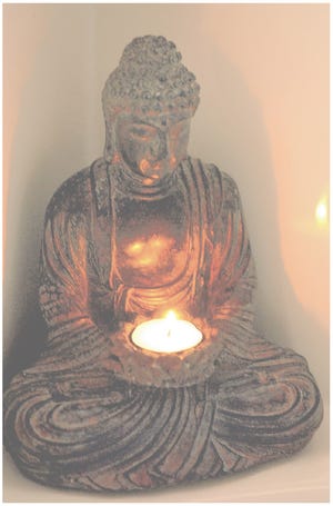 April Richmond has a Buddha in the retreat of her Stockton home.