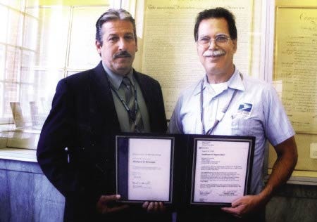Concord, Mass., letter carrier and York resident Richard Ferrante, right, received an award of appreciation from Postmaster Mark Howell recently.
Courtesy photo