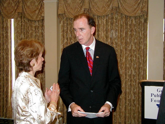 Peter Murphy, right, is a survivor of the 2001 terrorist attack on the Pentagon and former longtime counsel to the U.S. Marine Corps commandant. He addressed the Georgia Public Policy Foundation's Policy Briefing Luncheon on Wednesday. Afterward, he spoke with Holly Robinson, the foundation's senior vice president. MORRIS NEWS SERVICE/Walter C. Jones