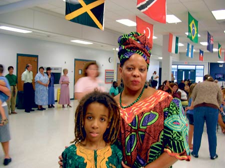 Ajani Dashield, 9, is shown with his mother, Kelly Williams. The fourth -grader was one of only nine Polk County students to get a perfect score on last year's FCAT tests.