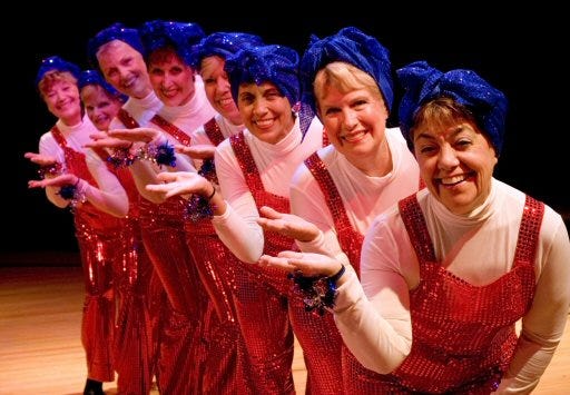 Myra Mervine, Linda Bitterly, Rosie Theiss, Jeanne Krebs, Nancy Feck, Sue Burton, Cherie Stubbs and Eileen Chaires, will perform four dances in the patriotic song and dance show to be held on September 11 at the Savannah Center in The Villages.