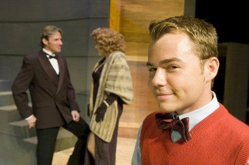 Todd Colbert portrays Benjy Stone as actors portray a scene from the upcoming Ocala Civic Theater production of My Favorite Year. Actors in the background are Eric McGraw as Alan Swann, left, and Dani Moreno-Fuentes as "The Babe".