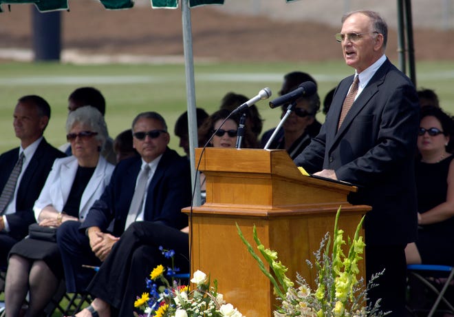 Former Georgia football player Bruce Yawn speaks at Coach Erk Russell\u2019s funeral service Sunday afternoon at Paulson Stadium. Russell is revered as the architect of Georgia Southern's football program and Georgia's Junkyard Dawg defense.