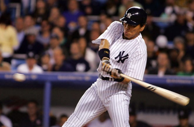 Hideki Matsui strokes an RBI single during the first inning vs. the Devil Rays last night in the Bronx. It was one of four hits for Matsui in his return to the lineup.
