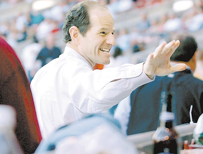 Should Eliot Spitzer, shown waving to fans at a baseball game in August in Buffalo, be elected governor of New York, basic economics may lead him to a pragmatic relationship with business.