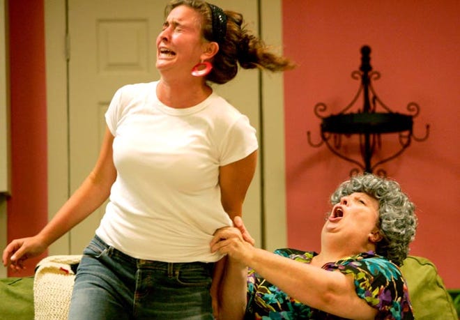 Elizabeth Holcomb (left), playing Catholic widow Rita, and Sue Peace, who plays a Baptist widow, rehearse a scene from the play "Bermuda Avenue Triangle" Tuesday evening. The production runs from Friday through Sunday at the Houma-Terrebonne Civic Center.