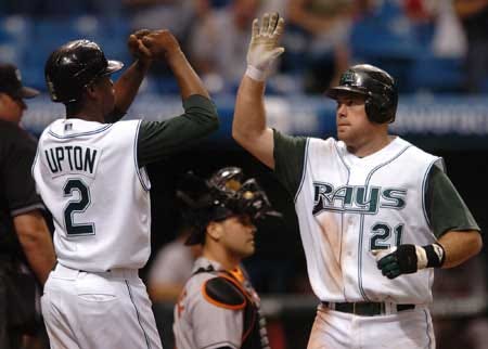 Tampa Bay's B.J. Upton (2) greets Ty Wigginton (21) after his two-run go-ahead home run on Wednesday night.