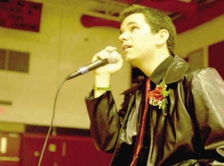 Ric Lang performes at a benefit concert for a scholarship fund created in honor of Lang's nephew, Derek Johnson, who died last may of a heart ailment.