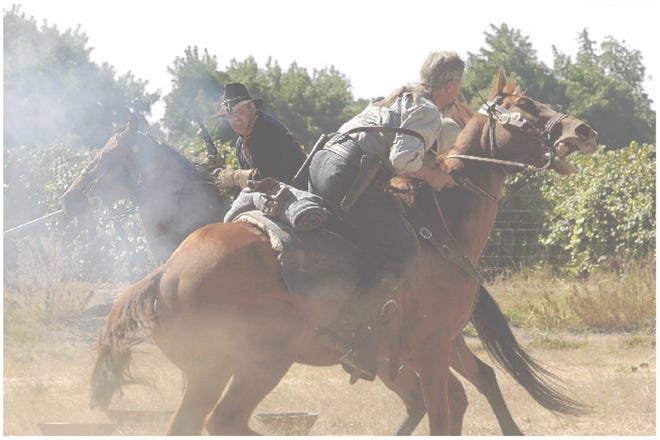 Civil War re-enactors battle it out at Dry Creek Civil War Days on Sunday. Participants brought a slice of history to Clements with battle re-enactments and a living history museum.