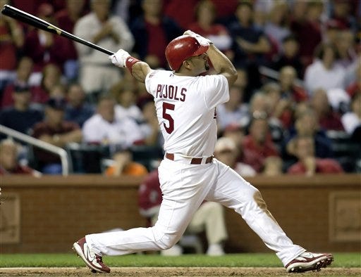 St. Louis Cardinals' Albert Pujols watches his three-run home run in the eighth inning against the San Diego Padres in their baseball game Wednesday, Sept. 27, 2006 at Busch Stadium in St. Louis. The Cardinals beat the Padres 4-2 to snap their seven-game losing streak.