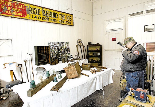 Don Wagner of Monticello takes pictures yesterday during an open house at the Middletown & New Jersey Railway Co. in Middletown. The open house continues today.