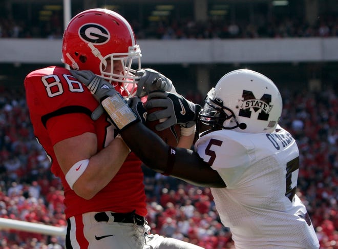 Georgia's Tripp Chandler hauls in a TD pass as Mississippi State's Tony Burks defends in the second quarter Saturday.