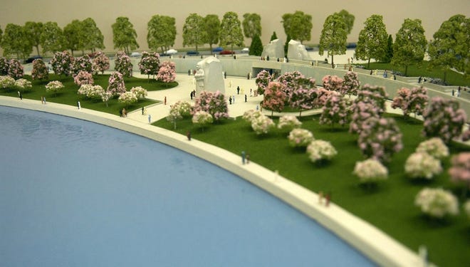 A model of the Martin Luther King Jr. National Memorial is seen in Washington. On Nov. 13, a half-mile from Lincoln's iconic statue, a diverse group of celebrities, corporate leaders and ordinary Americans will help turn the first shovels of dirt for a memorial honoring the slain civil rights leader.