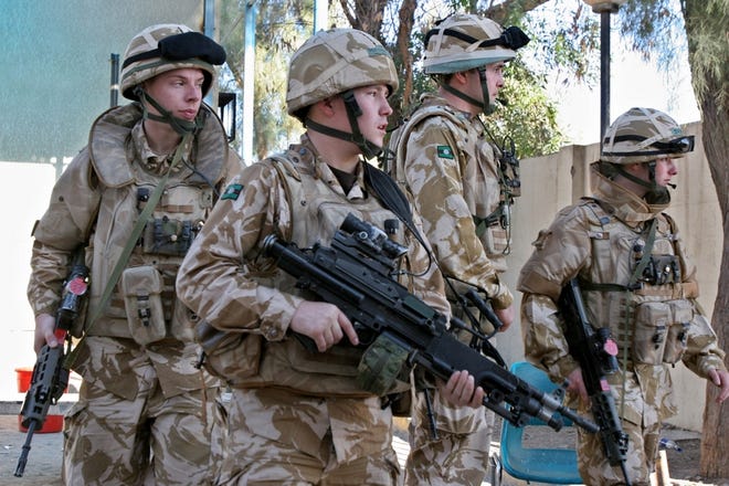 British soldiers patrol in Zubair, Iraq, on Friday.