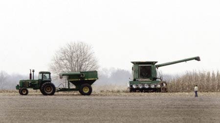 A combine works a field of corn in West Lafayette, Ind., Tuesday, Nov. 12, 2006. The ethanol industry's growing appetite for corn has pushed prices for the grain well above $3 a bushel, the highest in a decade, in a surge that could lead farmers next year to plant their largest corn crop in 60 years, an agricultural economist says.
			AP photo