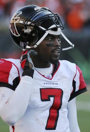 Michael Vick: Falcons QB split $10,000 fine between the family of a firefighter who died battling a blaze and a teammate's foundation.